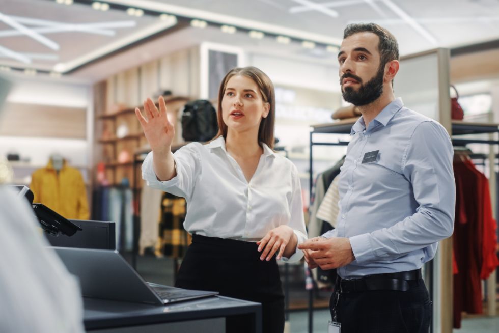 retail staff communicating confidently