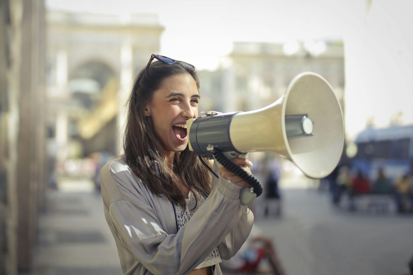 woman speaking into megaphone